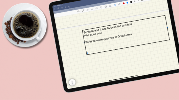 iPad pro showing Scribble in iPadOS14 for GoodNotes and a cup of coffee